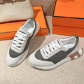 HERMES MAINLAND SNEAKER IN PALE GRAY SUEDE AND SMOKE GRAY BREATHABLE MESH FABRIC