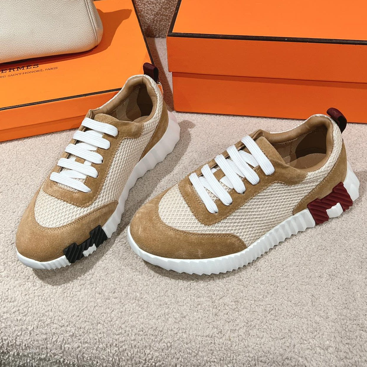 HERMES MAINLAND SNEAKER IN PEANUT BROWN SUEDE AND WHITE BREATHABLE MESH FABRIC